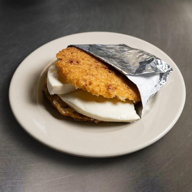 Pork Rind Arepa With Queso De Mano.